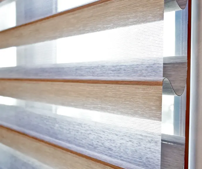 Zebra shades installed on a wide window